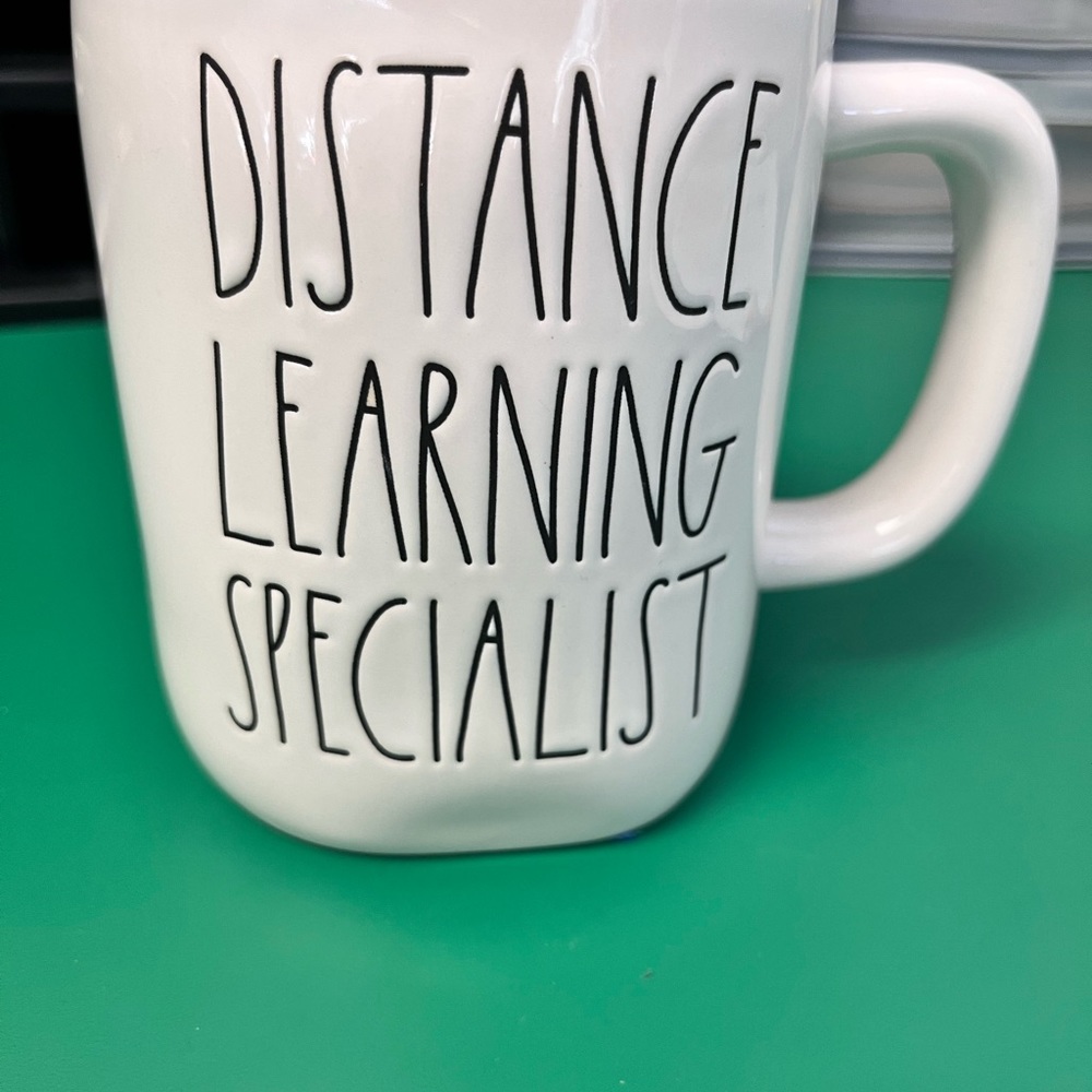 Rae Dunn mug. New condition, never been used. Cool teal inside glaze color.